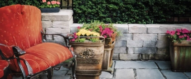 Olde Boston Garden Walls featuring weathered, rustic blocks with a historic charm, ideal for creating classic and durable garden borders and retaining walls